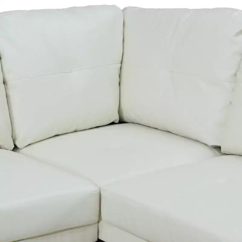 Canapé d'angle moderne en cuir synthétique - Grande forme en L, coussins moelleux, pouf de rangement, mobilier de salon contemporain