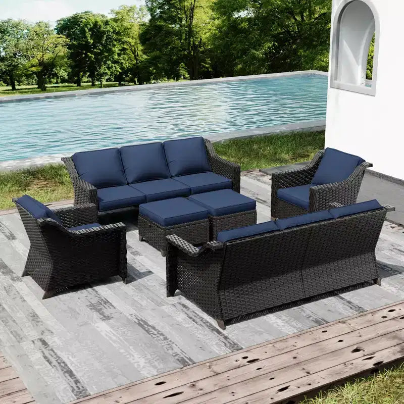 Ensemble de mobilier de jardin UPTIOT avec deux canapés, des chaises, des poufs et une table brasero pour des rassemblements spacieux