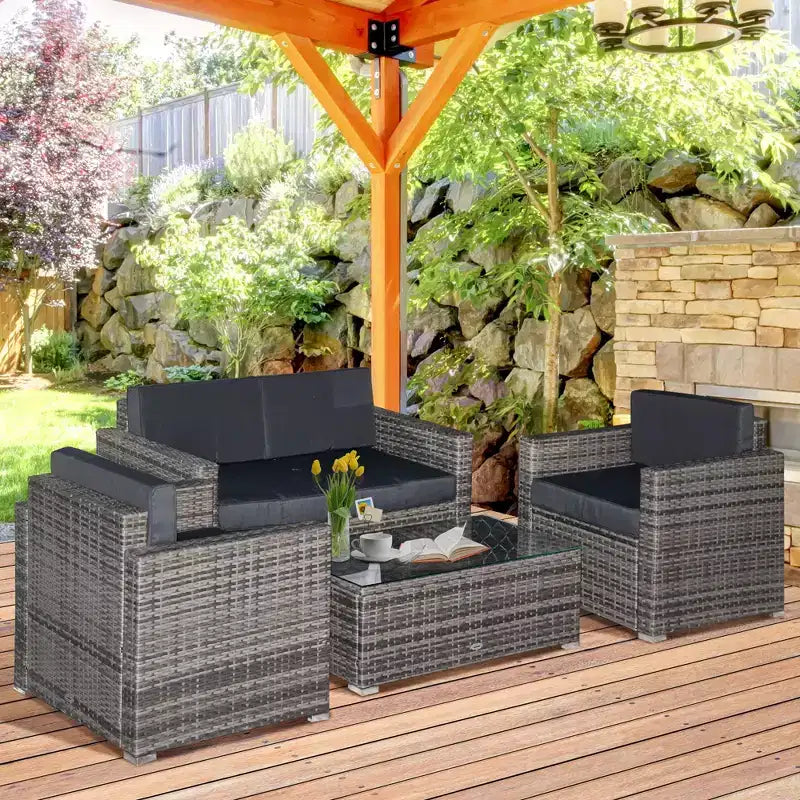 Ensemble de mobilier de jardin en rotin 4 pièces Outsunny, salon de conversation extérieur rembourré avec 2 chaises, causeuse et table basse en verre